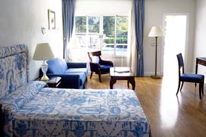 Executive double for single use with garden view, and private facilities